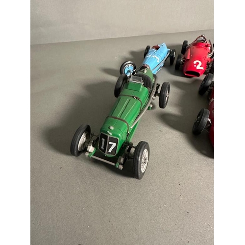 764 - A selection of Diecast model racing cars to include Ferrari, Bugatti and Lotus