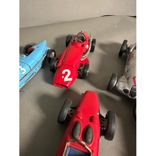 764 - A selection of Diecast model racing cars to include Ferrari, Bugatti and Lotus