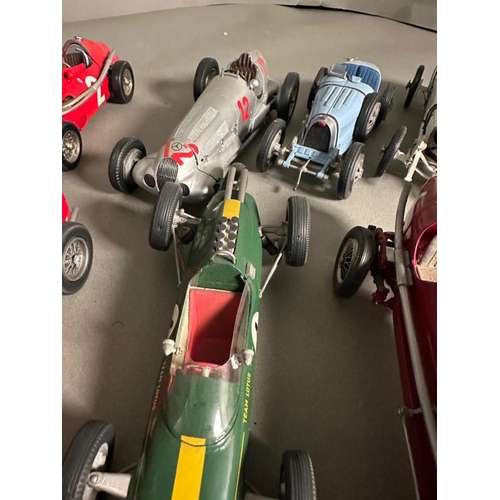 764 - A selection of Diecast model racing cars to include Ferrari, Bugatti and Lotus