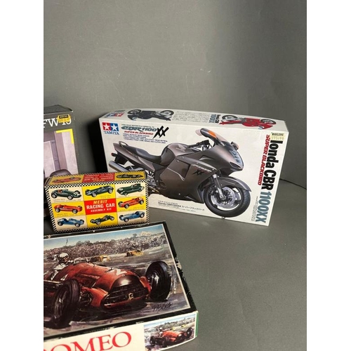 768 - Four boxed model kits of a Williams Renault , a Honda CBR and a Alpha Romeo and a Vanwell G.P