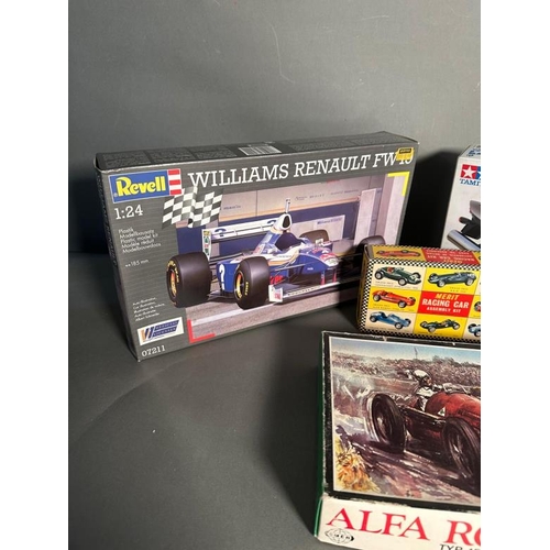 768 - Four boxed model kits of a Williams Renault , a Honda CBR and a Alpha Romeo and a Vanwell G.P