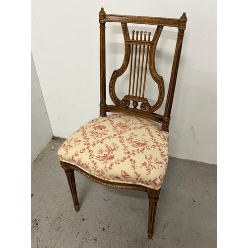 77 - A Louis style Lyre back hall chair