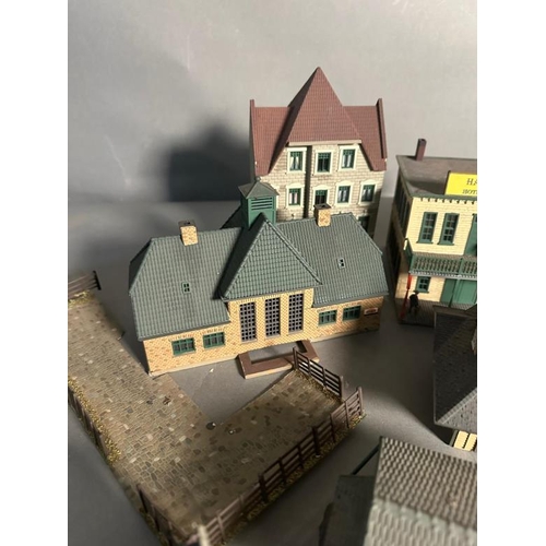 770 - A selection of model train layout buildings