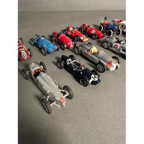 778 - A selection of Diecast racing cars to include Ferrari, Mercedes and Bugatti