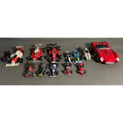 779 - A selection of Diecast model racing cars to include Ferrari, McLaren and Williams, some AF