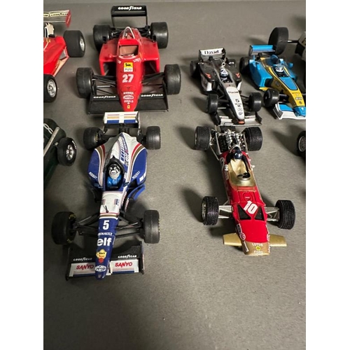 779 - A selection of Diecast model racing cars to include Ferrari, McLaren and Williams, some AF