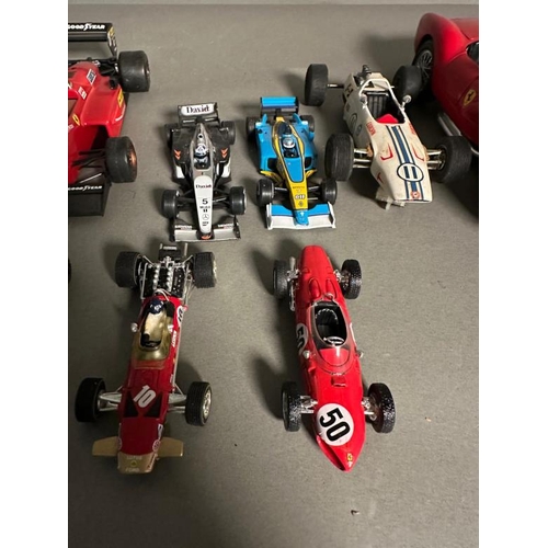 779 - A selection of Diecast model racing cars to include Ferrari, McLaren and Williams, some AF