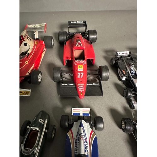 779 - A selection of Diecast model racing cars to include Ferrari, McLaren and Williams, some AF