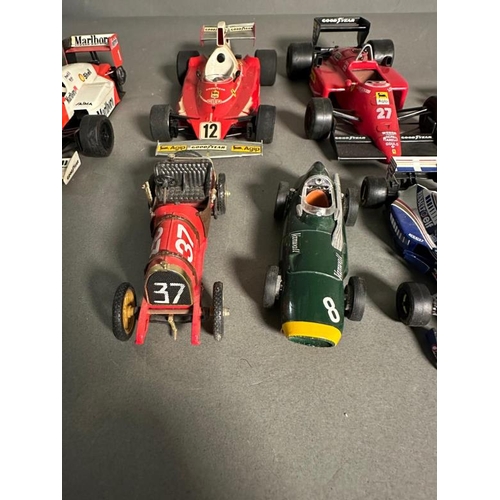 779 - A selection of Diecast model racing cars to include Ferrari, McLaren and Williams, some AF