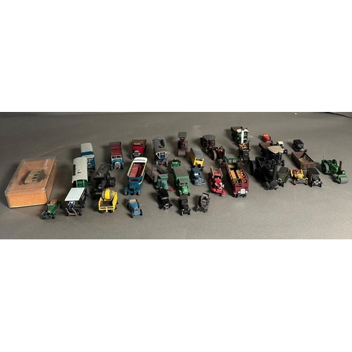 780 - A selection of play worn plastic and Diecast vehicles to include steam rotters, buses and carts