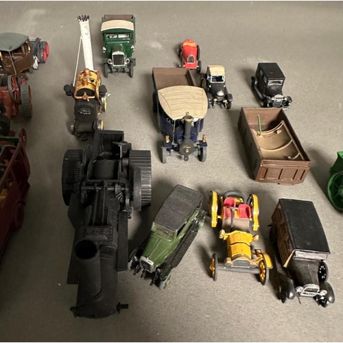 780 - A selection of play worn plastic and Diecast vehicles to include steam rotters, buses and carts