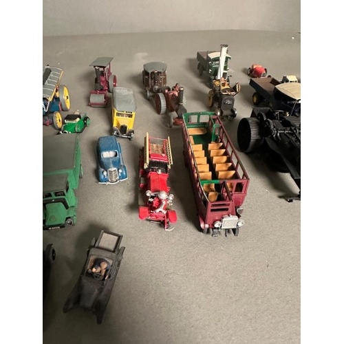 780 - A selection of play worn plastic and Diecast vehicles to include steam rotters, buses and carts