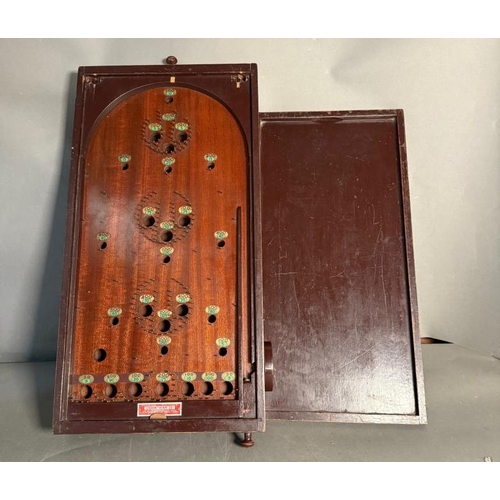 785 - A Corinthian vintage Bagatelle game with lid and balls