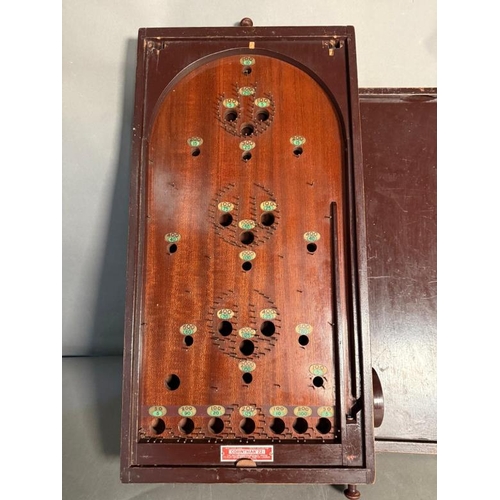 785 - A Corinthian vintage Bagatelle game with lid and balls