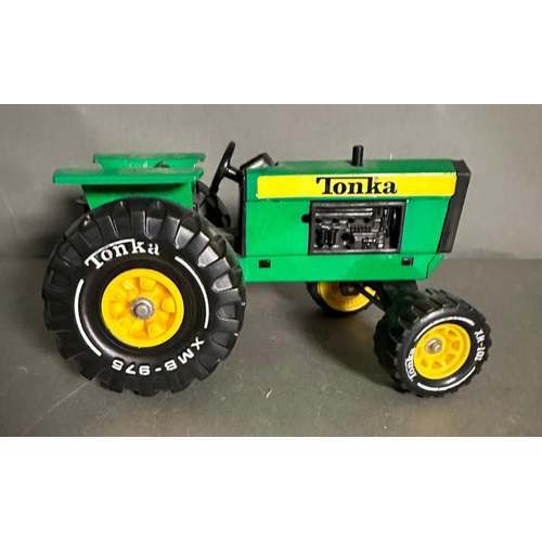 794 - Two vintage Tonka toy tractors, one with a trailer