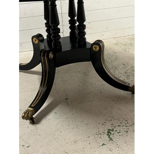 83 - Ebonised pedestal dining table with brass ornate decor  (H75cm Dia137cm)