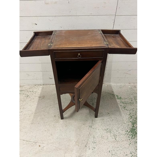 88 - A Georgian mahogany fold over top wash stand cupboard, standing on square section legs with the stre... 