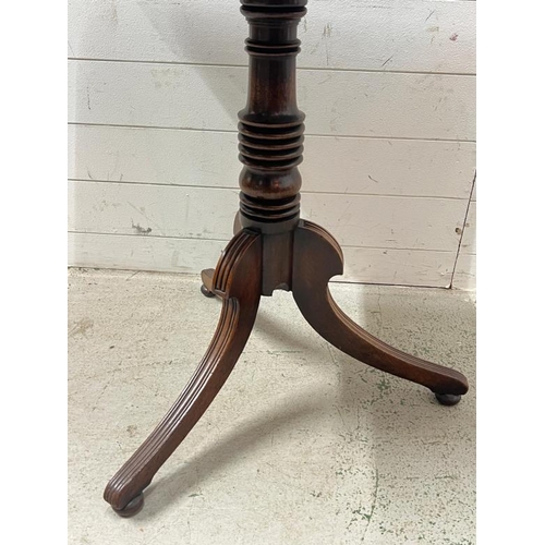 92 - A Victorian mahogany tilt top tripod table (H70cm W76cm D60cm)