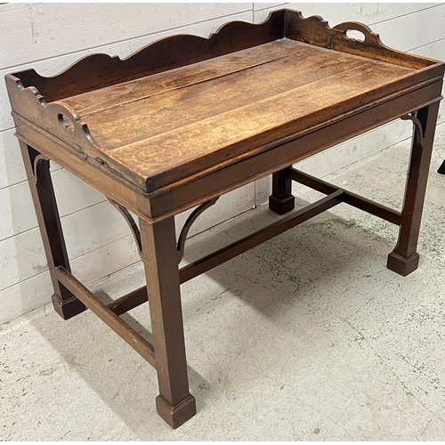 95 - A Georgian mahogany butlers tray on stand, gallery tray sits on square legs (H61cm W80cm D50cm)