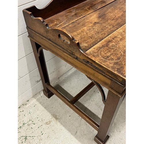 95 - A Georgian mahogany butlers tray on stand, gallery tray sits on square legs (H61cm W80cm D50cm)