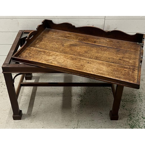 95 - A Georgian mahogany butlers tray on stand, gallery tray sits on square legs (H61cm W80cm D50cm)