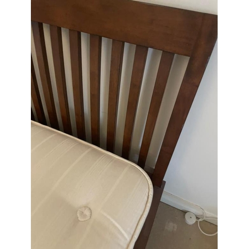 97 - A mahogany slatted double bed frame with mattress (W158cm)