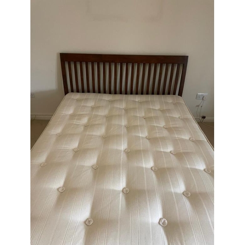 97 - A mahogany slatted double bed frame with mattress (W158cm)