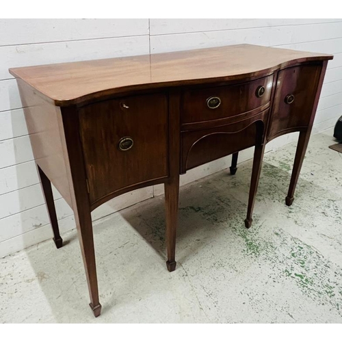 98 - A Serpentine Edwardian mahogany sideboard (H91cm W138cm D61cm)