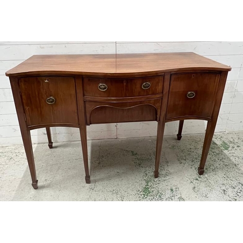 98 - A Serpentine Edwardian mahogany sideboard (H91cm W138cm D61cm)