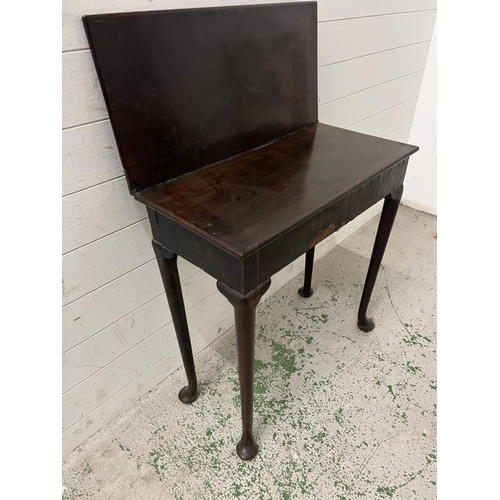 10 - A mahogany fold over tea table on cabriole legs AF (H73cm W70cm D34cm)