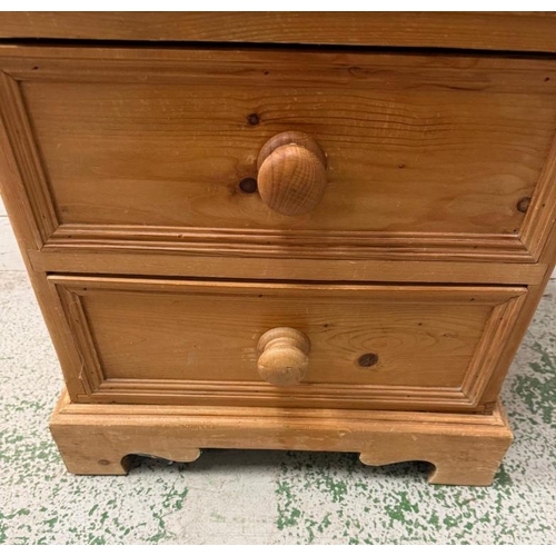 109 - A pine bedside with three drawers (H60cm W46cm D38cm)