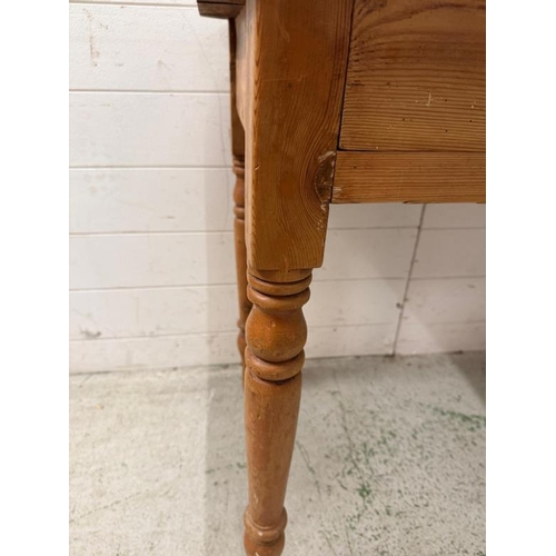 111 - Antique pine side table with two drawers to front (H73cm W92cm D52cm)