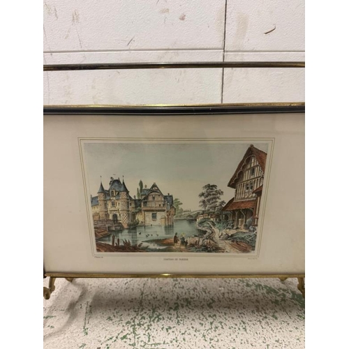 123 - A vintage French brass magazine rack with glazed pictural scenes to sides