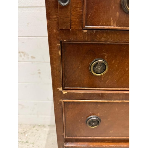 125 - A Batchelors chest of drawers on bracket feet with four graduated drawers and with hinged double top... 