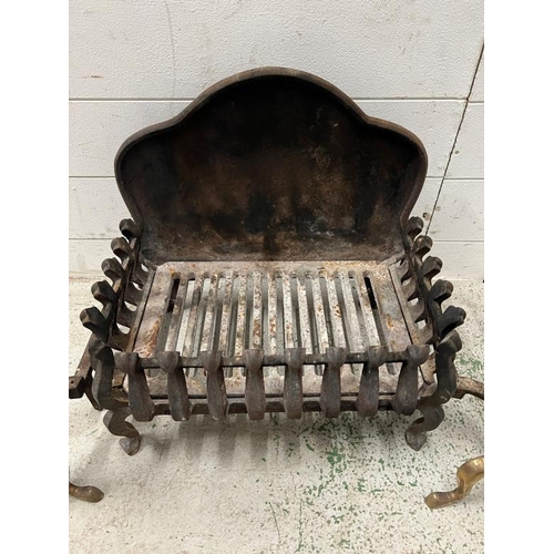 134 - A cast fire grate and a pair of brass fire dogs (H41cm W45cm)