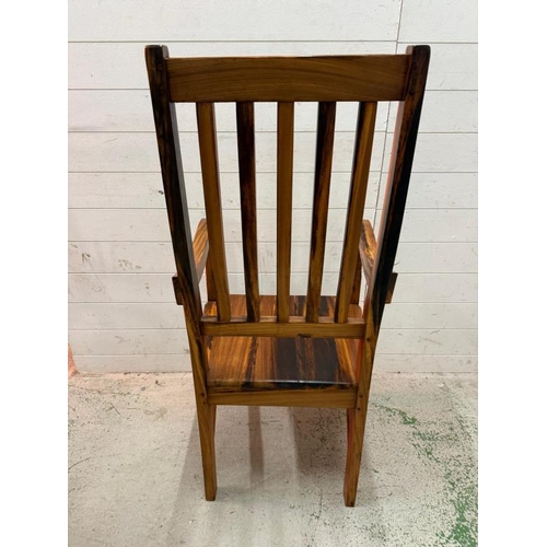 138 - Two South African hardwood railway sleeper high back chairs