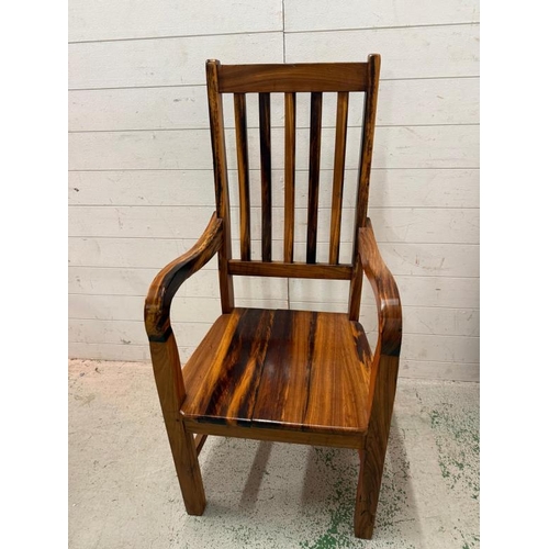 138 - Two South African hardwood railway sleeper high back chairs