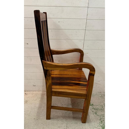 138 - Two South African hardwood railway sleeper high back chairs