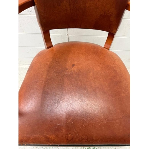 142 - A vintage bridge chair upholstered in brown leather