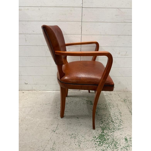 142 - A vintage bridge chair upholstered in brown leather