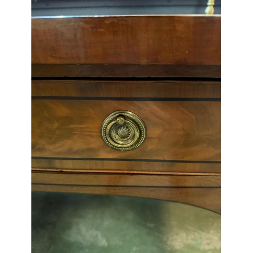 169 - A George III style mahogany sideboard with breakfront, the brass rail back with final ends, over a c... 