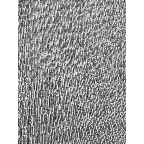 195 - A large contemporary rug in a pale green and white weave 352cm x 380cm