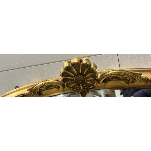 205 - A giltwood arch over mantle mirror 115cm x 112cm