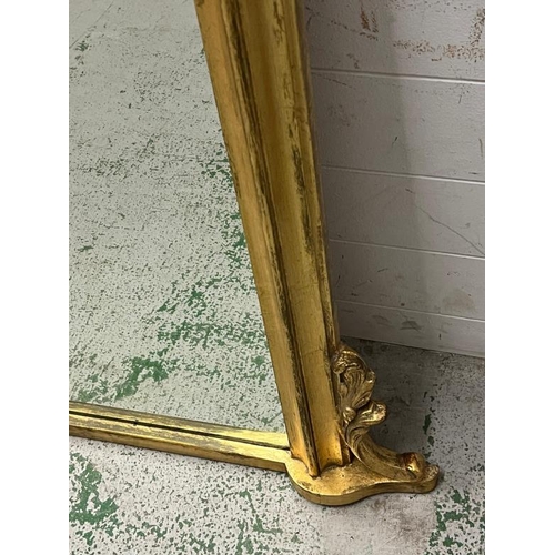 205 - A giltwood arch over mantle mirror 115cm x 112cm