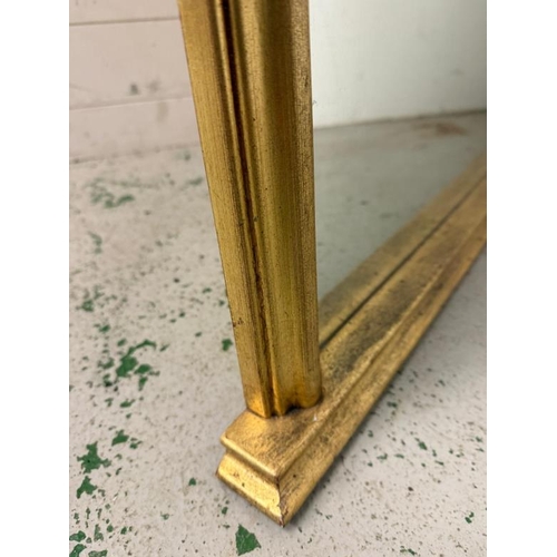 214 - An arched gilt framed over mantle mirror. 120x120