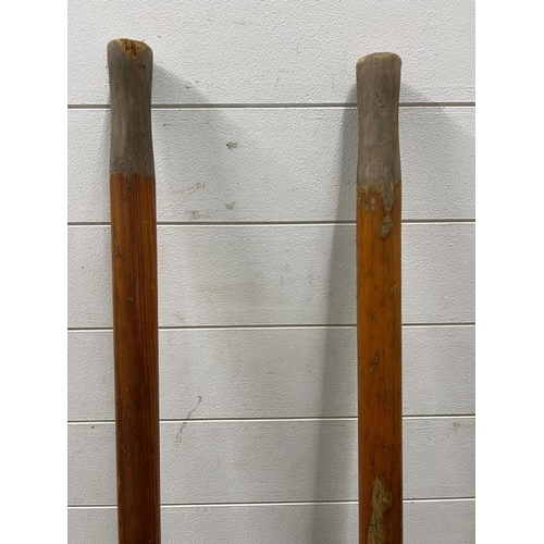 234 - A pair of antique wooden rowing oars