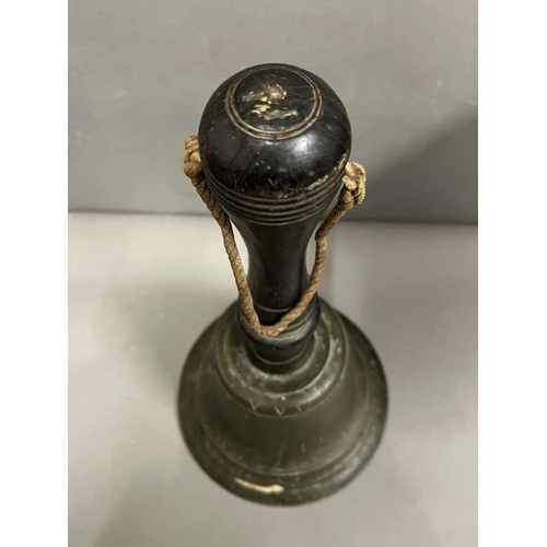 239 - A bronze hand bell H40cm