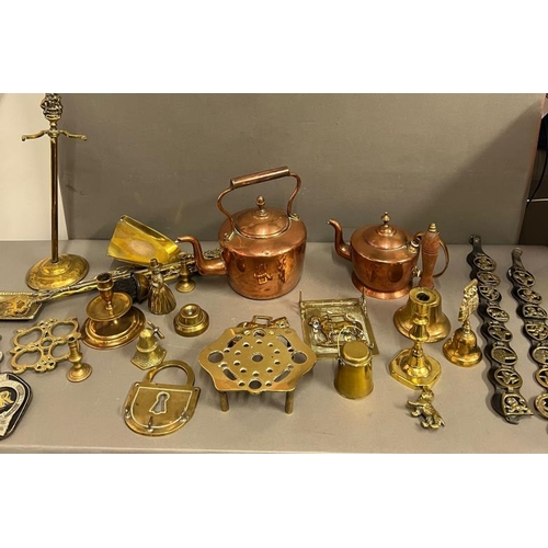 241 - A large collection of brass and copper to include hand bell and horse brass