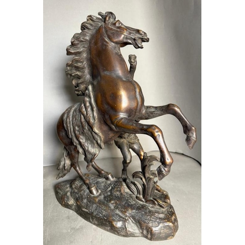 244 - Two late 19th Century classical Marley horse figural groups of rearing horses and semi clad figures ... 