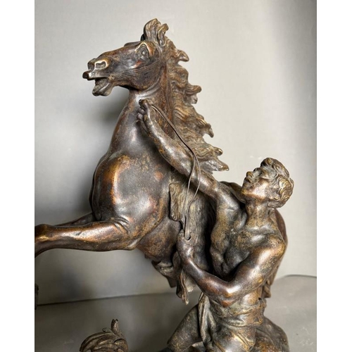 244 - Two late 19th Century classical Marley horse figural groups of rearing horses and semi clad figures ... 